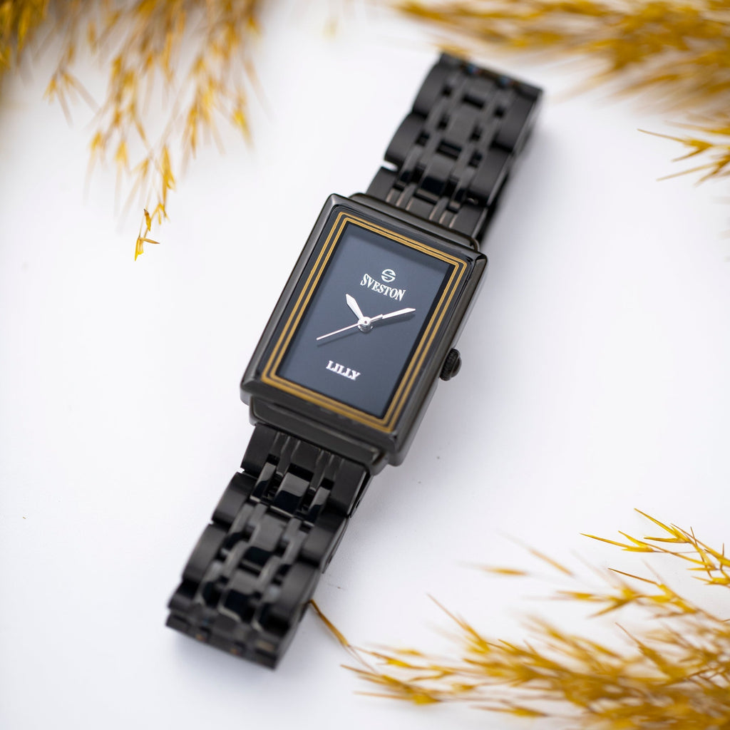 A FEMININE STAINLESS-STEEL WATCH FEATURING A 21MM DELICATE DIAL AND A SLEEK, REFINED DESIGN